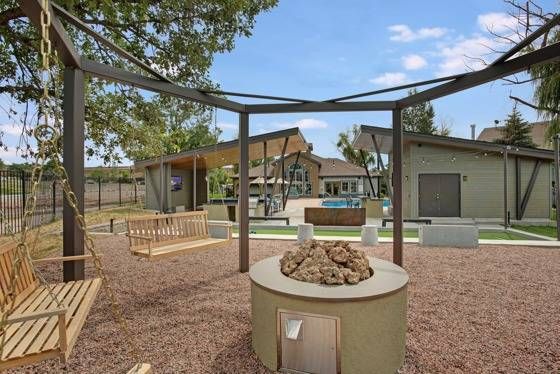 Outdoor Fire Pit with Swinging Seatings | Apartments For Rent Colorado Springs | Willows at Printers Park