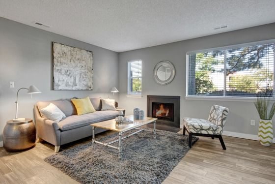 Elegant Living Area with Fireplace | Apartments Near Aurora CO | The Grove at City Center Apartments