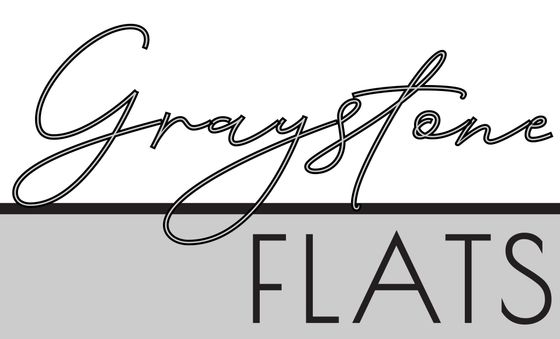Modern minimalist logo of Graystone Flats with elegant typography on a sleek background.