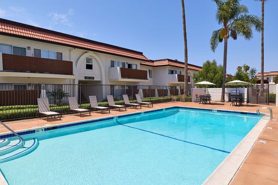 Villa Del Mar Pool and Lounge area with umbrellas