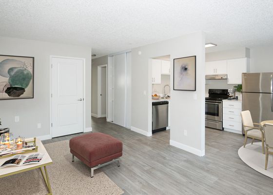 virtually staged living room with vinyl wood like flooring with coffee table at 81 powell apartments