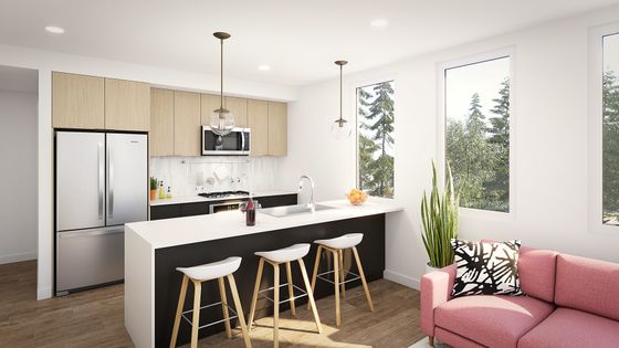 rendering of kitchen with stainless steel appliances and peninsula breakfast bar at Novus