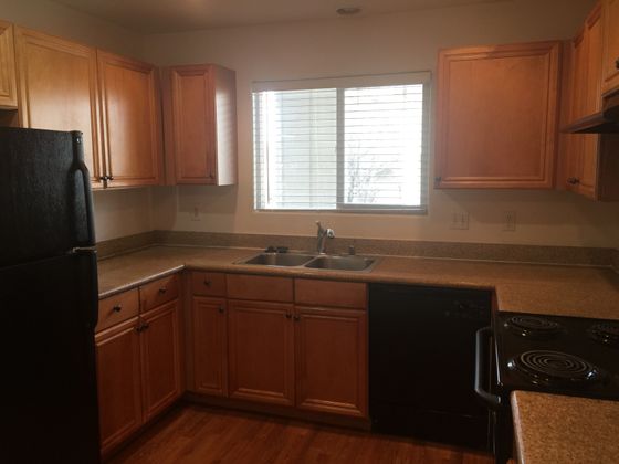 kitchen with black appliances at park silverada