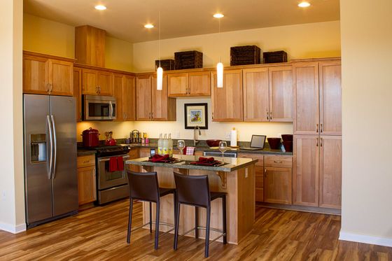 kitchen with breakfast nook and Stainless Steel appliances and granite countertops at the meridian apartments