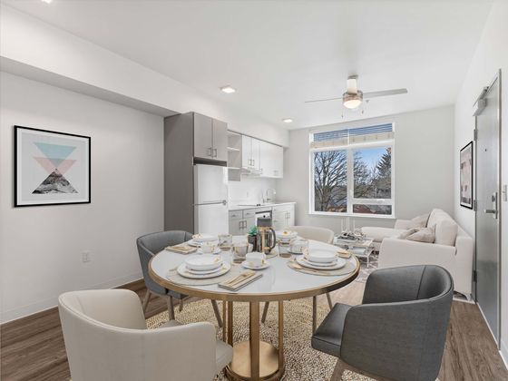 Styled dining area in a one-bedroom apartment at Koz on 13th.