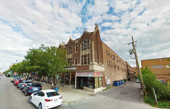 1363-67 East 53rd Street a twenty six unit three story brick property with two storefronts in Hyde Park.