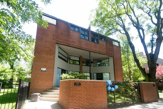 1901 North Orchard a modern five unit red brick building with mature trees in Lincoln Park.