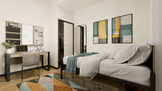 Modern bedroom design with a cozy bed, stylish desk setup, and vibrant artwork. Features ample storage and a walk-in closet.