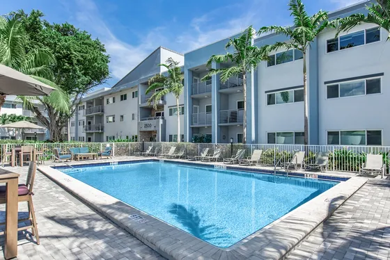 2500 Boca on Federal Apartments Swimming Pool with Lounge Chairs