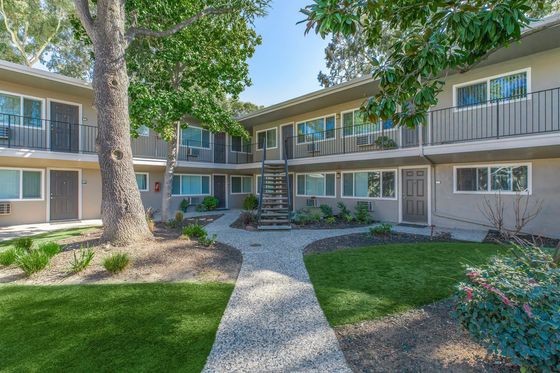 Park Lafayette Apartments Building Exterior with Lush Landscaping