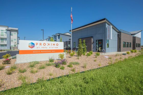 Proximo at Pena Station Apartments Leasing Office and Monument Sign