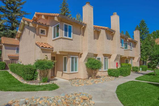 Southwood Townhomes Building Exterior with Landscaped Walkway and Private Entrances
