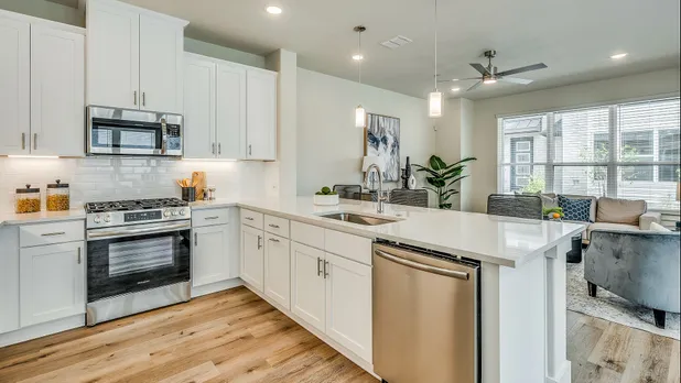 Furnished kitchen with stainless steel appliances