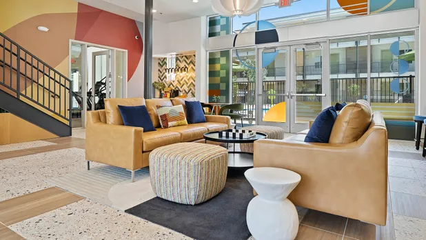 couches leading out to pool area