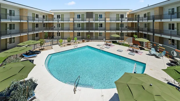 swimming pool with chairs