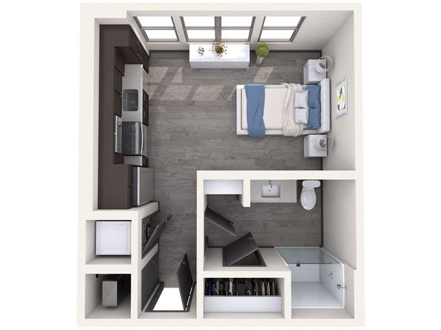 Chic studio apartment floor plan featuring an open concept bedroom, modern kitchen, and compact bathroom.