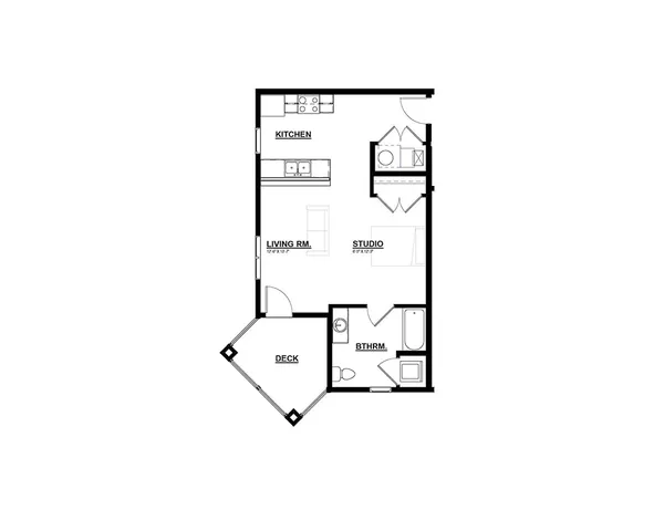 Modern floor plan showcasing a studio apartment with a spacious living room, full kitchen, bathroom, and private deck, ideal for contemporary living.