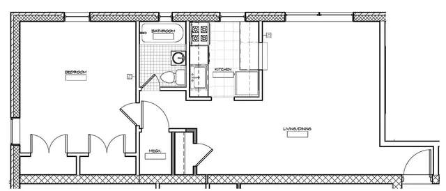 Modern apartment floor plan featuring a spacious bedroom, combined kitchen and living/dining area, and a well-appointed bathroom.