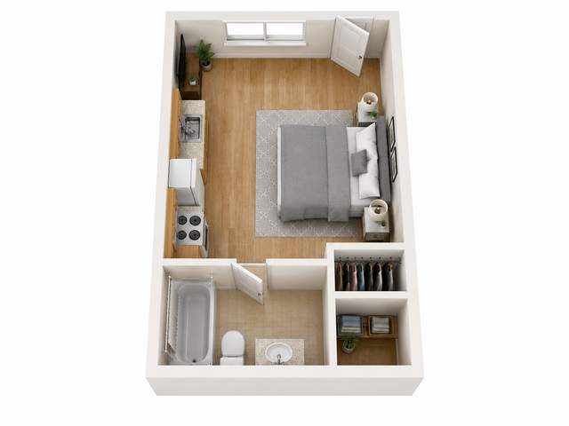 Modern studio apartment floor plan featuring a cozy bedroom area with ensuite bathroom, compact kitchen, and built-in closet.