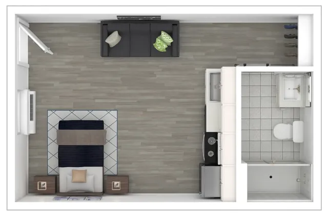 Large studio floor plan featuring a cozy living area, compact kitchenette, and modern bathroom design.
