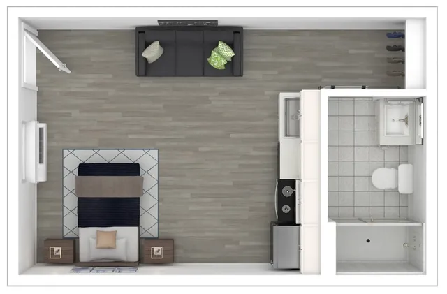 Large studio floor plan featuring a cozy living area, compact kitchenette, and modern bathroom design.