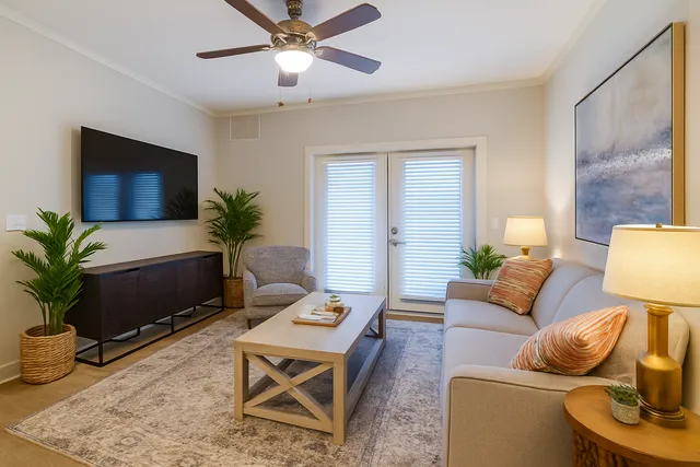 A spacious and well-lit living room designed for comfort and relaxation.