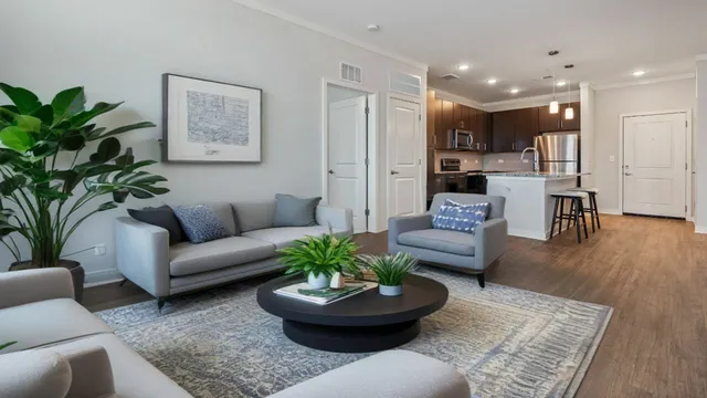 A spacious and well-lit living room designed for comfort and relaxation.