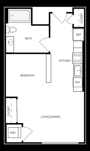 Modern studio apartment floor plan showcasing an open living and dining area, a well-equipped kitchen, cozy bedroom space, and convenient in-unit laundry.