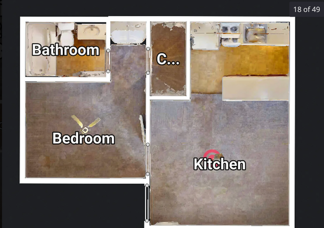 Compact 2D floor plan showcasing a cozy bedroom, well-equipped kitchen, and modern bathroom.