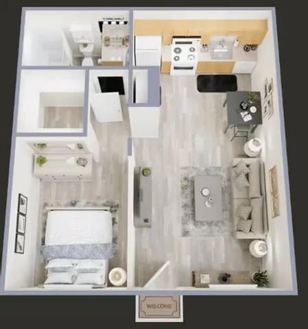 Located at 513 W Panorama Rd in Tucson, Arizona, this compact single-floor unit offers a well-organized layout comprising a kitchen, bedroom, bathroom, and closet. Light wood-style flooring runs throughout, creating a clean and cohesive look across the entire space.The kitchen is efficiently designed with warm honey-toned wood cabinetry extending to the upper walls, light countertops, and white appliances including a refrigerator, electric range, microwave, dishwasher, and a sink &mdash; providing full functionality in a compact footprint. A textured ceiling adds subtle character throughout the unit.The open living area adjoins the kitchen and features a ceiling fan with integrated lighting, offering both comfort and practicality. The bedroom is an intimate, well-proportioned space highlighted by a window with vertical blinds that frames views of the surrounding neighborhood, including palm trees, allowing natural light to filter in.The bathroom is neatly appointed with a wood-framed medicine cabinet, a wide vanity mirror with globe lighting, a single-sink wood vanity with a white countertop, and a full tub-shower combination. The consistent wood-toned cabinetry ties the bathroom design cohesively to the kitchen aesthetic. A dedicated closet rounds out this efficiently planned Tucson residence.