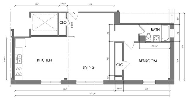 Modern floor plan displaying an expansive kitchen, open living area, one bedroom with closet, and a spacious bathroom.