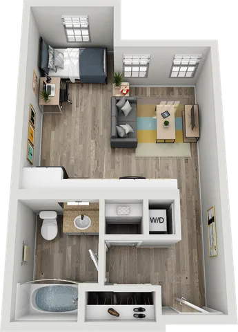 Modern studio apartment floor plan featuring an open-concept living and sleeping area, compact kitchen, and stylish bathroom.