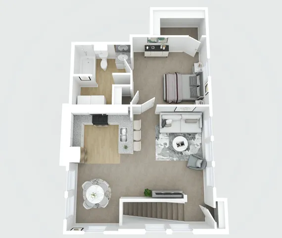 Modern layout showcasing a cozy bedroom, elegant bathroom, open living room, and chic kitchen with dining area. This floor plan is located above garages making for private living.