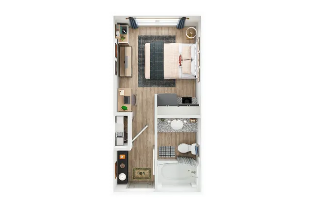 Modern studio apartment floor plan showcasing a cozy bedroom, sleek bathroom, compact kitchen area, and a stylish work desk.
