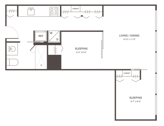 Elegant studio apartment floor plan showcasing dual sleeping areas, efficient kitchen, and combined living/dining space.