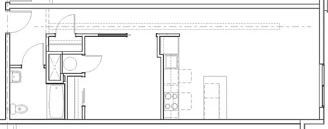 Modern floor plan showcasing a spacious kitchen with island, full bathroom, and open living area perfect for stylish living.