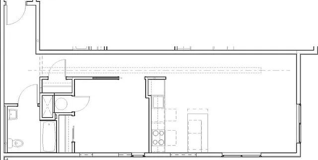 Modern floor plan showcasing a spacious open-concept layout, featuring a sleek kitchen and bathroom designed for convenience and style.