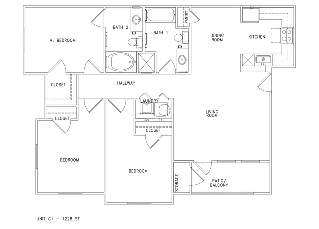 Elegant floor plan of Unit C1 showcasing three bedrooms, modern kitchen, open dining and living areas, two bathrooms, laundry room, and a patio/balcony within 1228 sq ft.