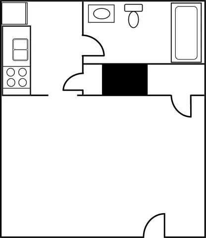 Studio apartment floor plan featuring a modern kitchen and spacious bathroom layout.