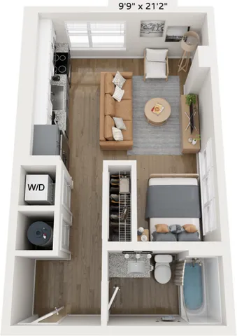 Chic studio apartment floor plan showcasing an open living area with a comfortable sofa, modern kitchen, cozy bed space, and convenient in-unit laundry. Perfect compact living solution.