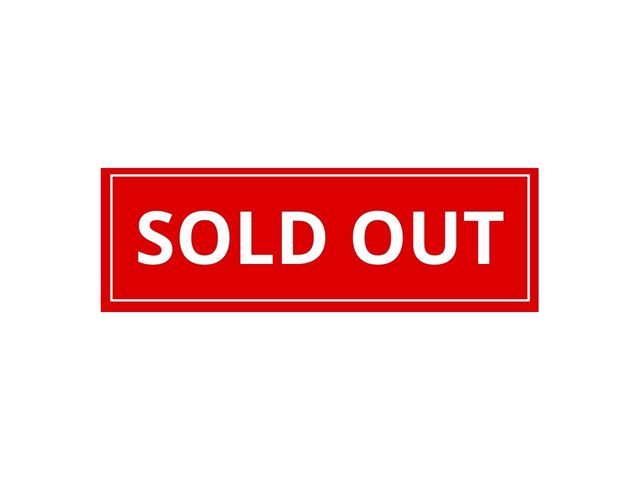 Red and white \'Sold Out\' sign indicating successful apartment sales.
