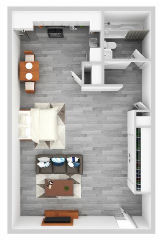 Modern studio apartment floor plan with an open-concept kitchen, cozy sleeping area, compact dining space, and stylish bathroom.
