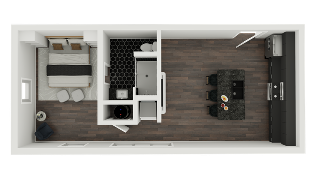Modern floor plan showcasing a spacious studio layout with an elegant bedroom, luxurious bathroom, and an open kitchen with a stylish island.