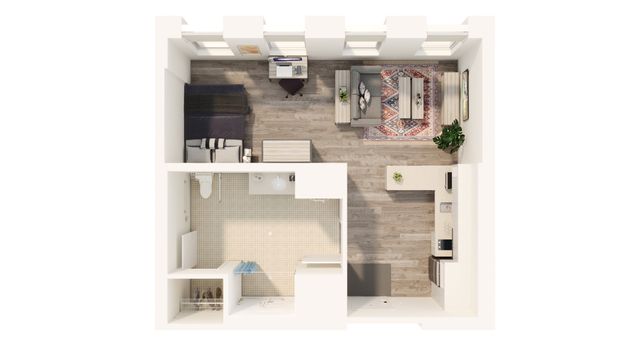 Chic studio apartment floor plan with an open layout, cozy living area, and modern kitchen.