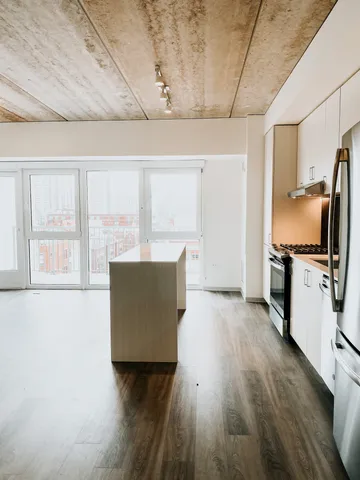 Kitchen, Island and Balcony