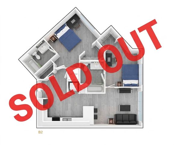 Chic and modern B2 floor plan featuring two bedrooms, a spacious living area, and a well-appointed kitchen, marked as sold.