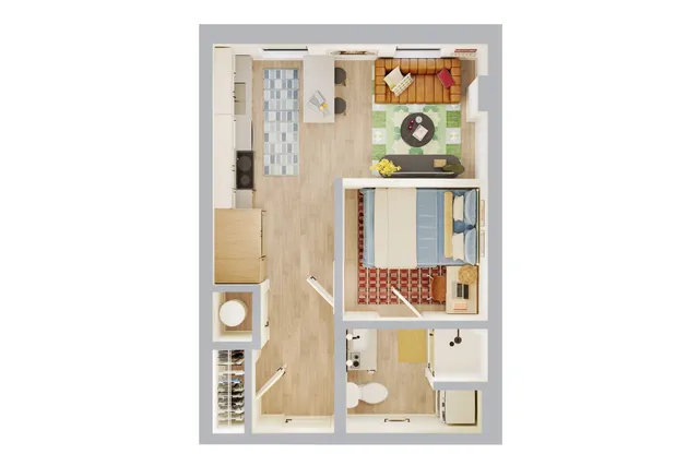 Chic open floor plan showcasing a bedroom adjoining a cozy living space with colorful decor, a sleek kitchen area, and a modern bathroom.