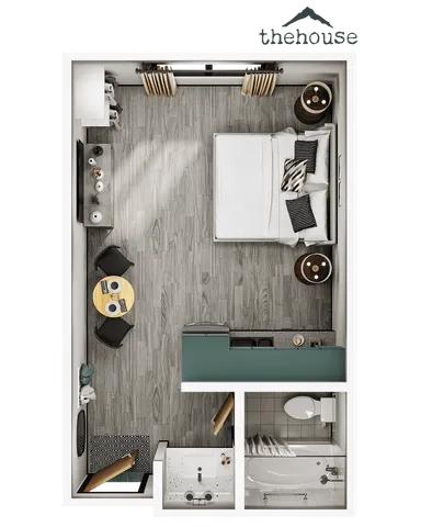 Chic studio apartment floor plan featuring a cozy bedroom space, modern kitchen area, compact dining setup, and a stylish bathroom with bathtub.