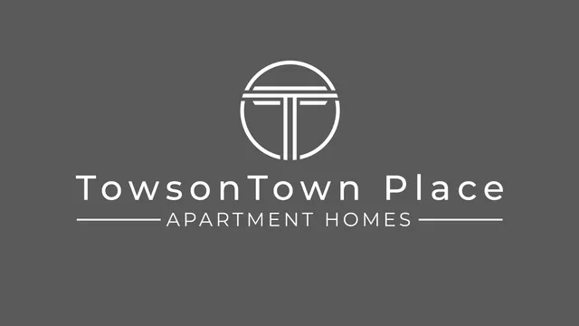 TowsonTown Place Apartment Homes logo on gray background