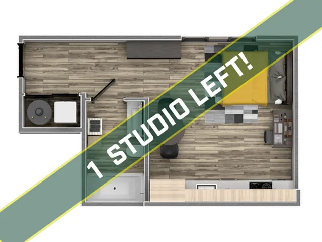 Modern studio apartment floor plan featuring open-plan living and sleeping area, compact kitchen, and sleek bathroom. Limited availability!